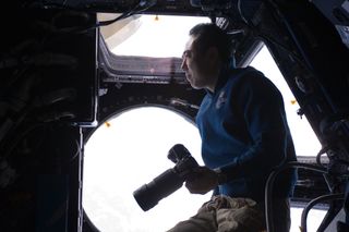 Satoshi Furukawa Looks Out of the ISS Cupola