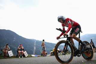 Soudal Quick-Step's Danish rider Kasper Asgreen cycles during the 16th stage of the 110th edition of the Tour de France cycling race, 22 km individual time trial between Passy and Combloux, in the French Alps, on July 18, 2023. (Photo by Anne-Christine POUJOULAT / AFP)