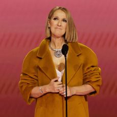 Celine Dion speaks onstage at the 2024 Grammy Awards