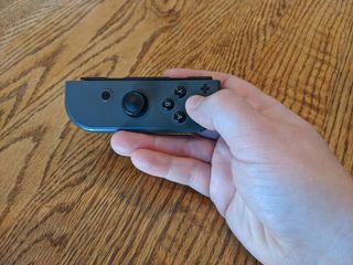 How to pair Joy-Cons Nintendo Switch Lite: If playing with half a Joy-Con, the button furthest on the right will act as the A button
