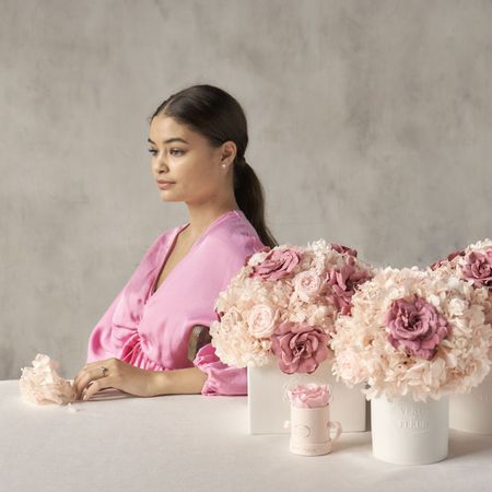 A woman with rose bouquets
