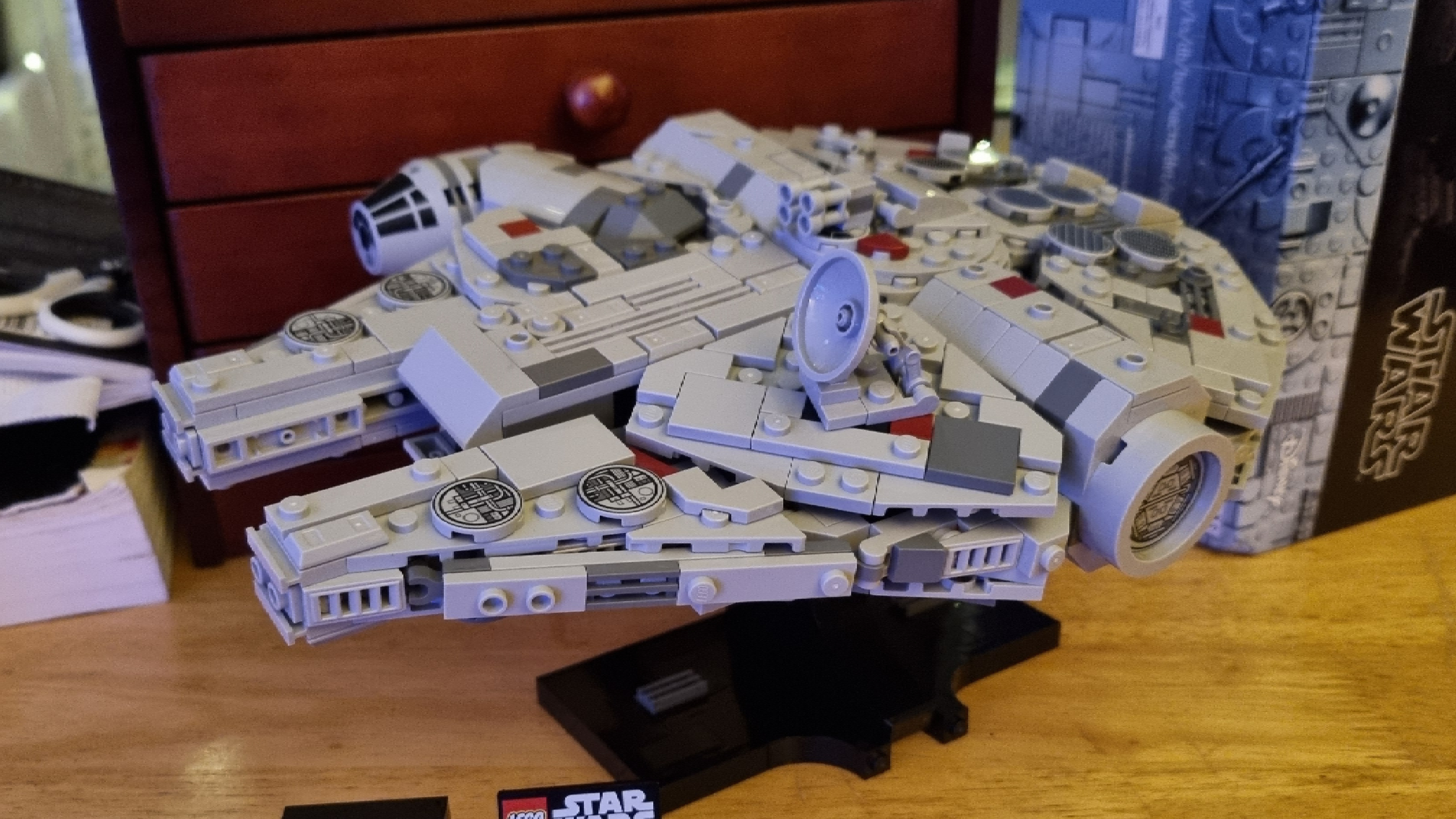 The Lego Millennium Falcon 25th Anniversary Edition in various poses