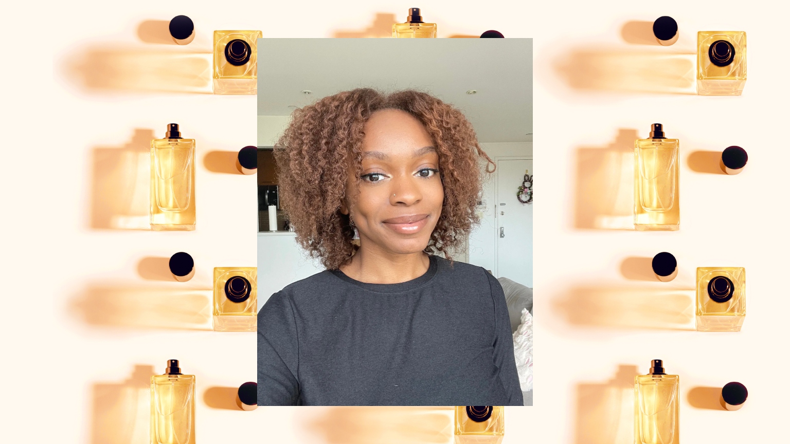 Danielle Jackson wearing a black shirt with cinnamon brown hair on a gold and black perfume background