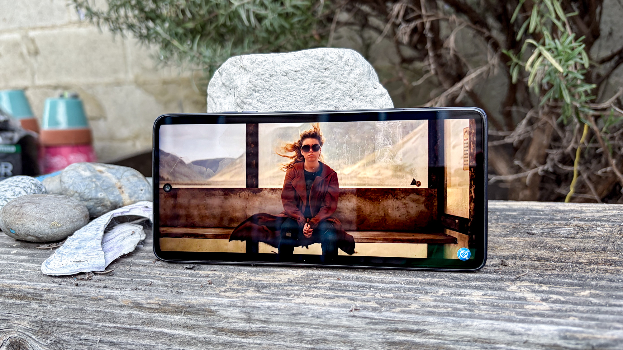 Moto G Power 2026 in hand streaming supergirl