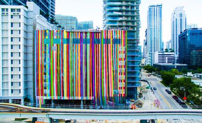 A mural adorns the exterior of SLS Brickell