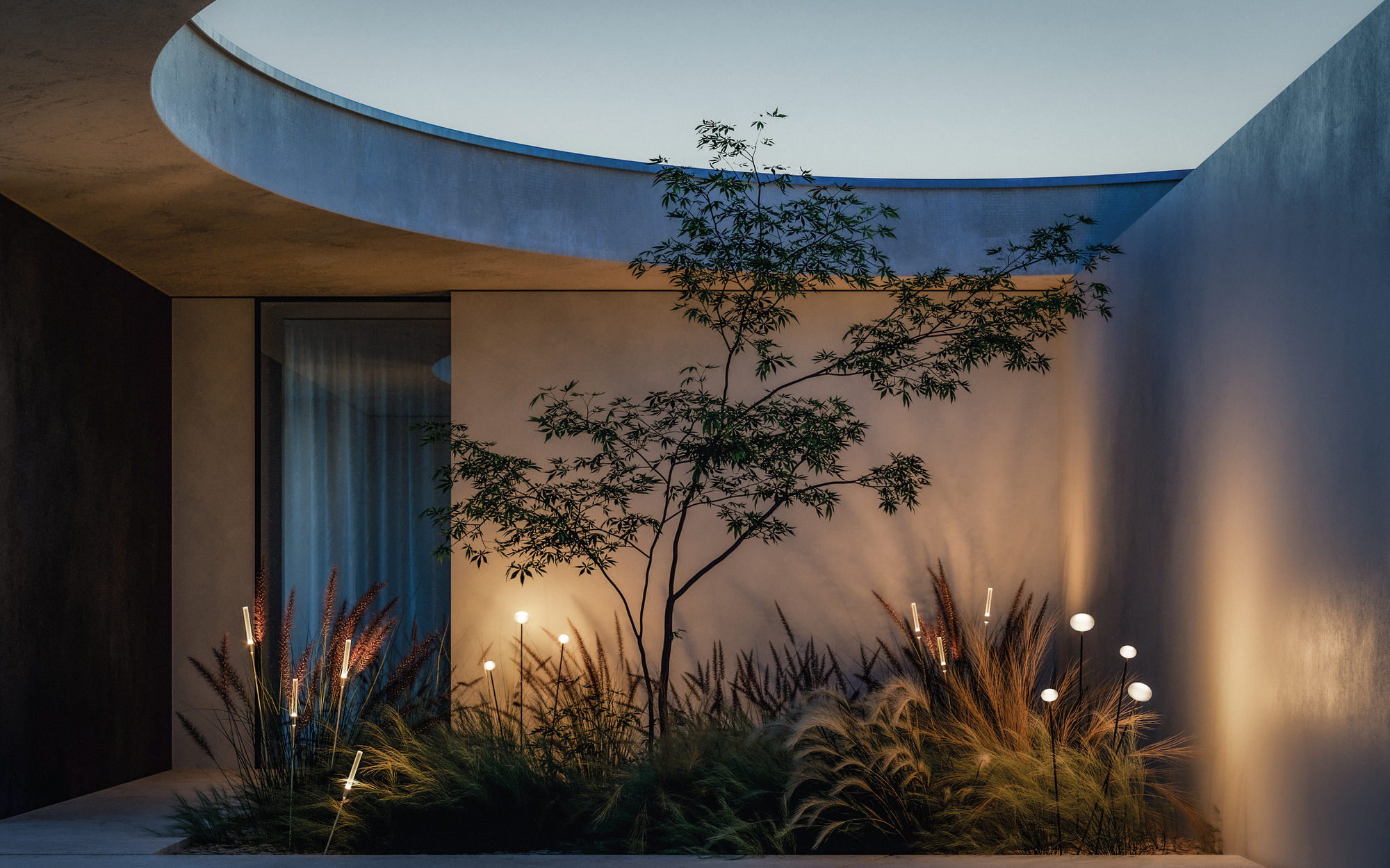 An outdoor patio area at dusk with grasses in a border and stake lights