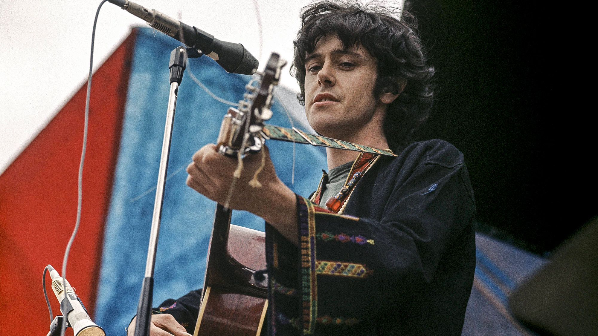 Donovan performs live on stage at the Seventh National Jazz and Blues Festival at Windsor racecourse in Berkshire on 13th August 1967. 