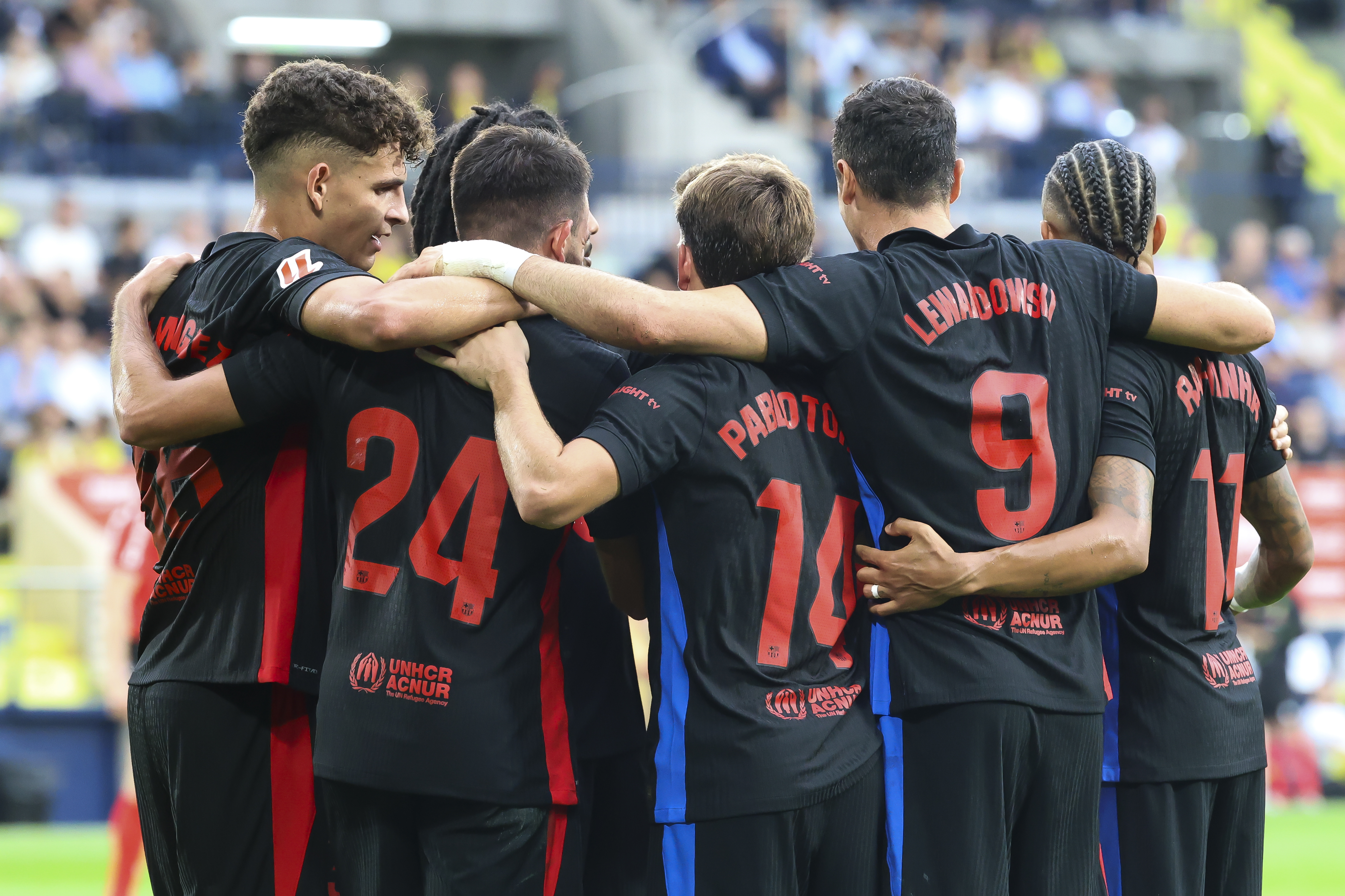 Robert Lewandowski celebrates with his Barcelona team-mates after scoring against Villarreal in La Liga in September 2024.