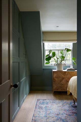 green bedroom ideas with painted wall panelling