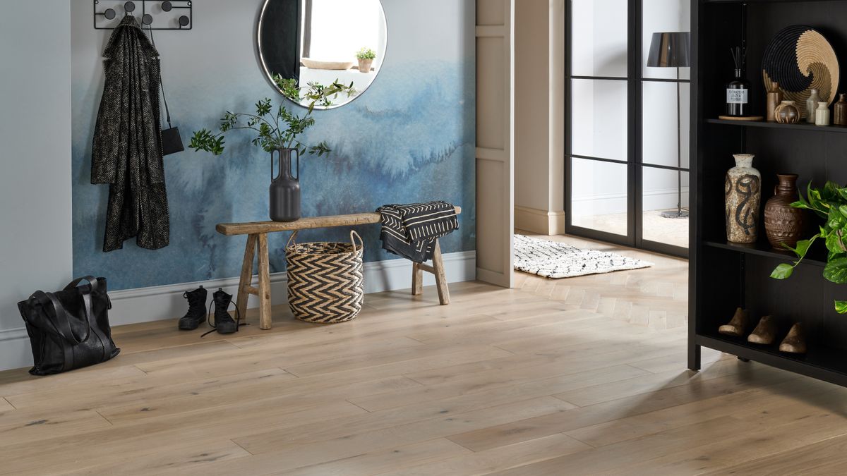 blue modern hallway with wooden flooring and small bench