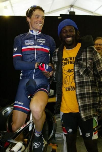 Sylvain Chavanel (France) enjoys joke with rider from St Kitts Nevis