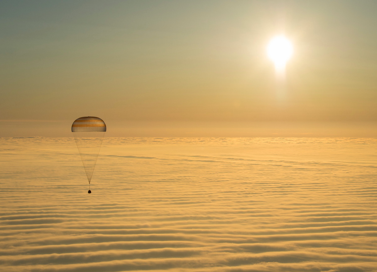 Soyuz Descending Above the Clouds