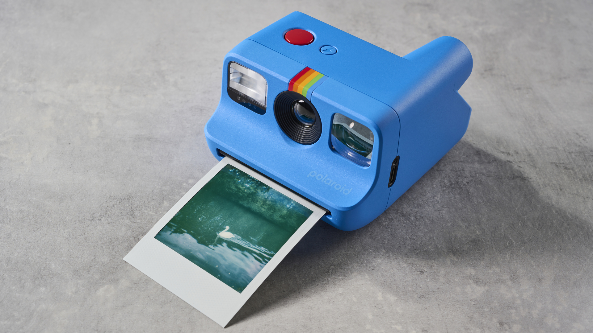 A blue Polaroid Go Gen 2 instant camera