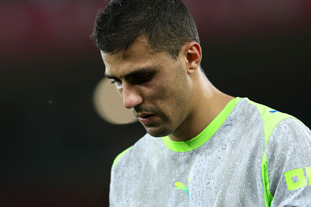 Rodri of Manchester City appears dejected following the team's 1-1 draw against Bournemouth