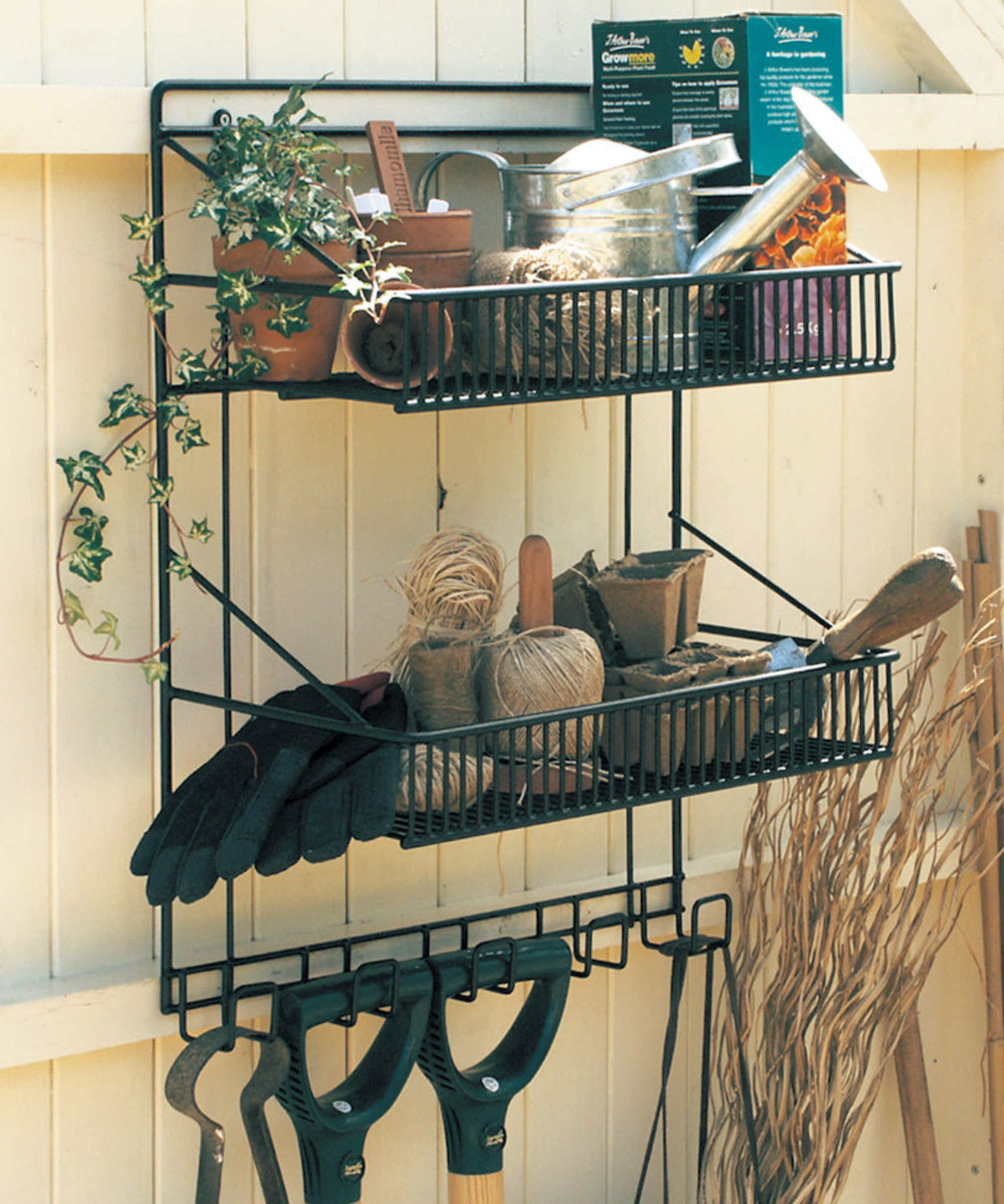 Hanging shelf with gardening tools