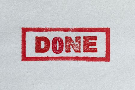 A bold red stamp with the word "done" inside a rectangular frame. 