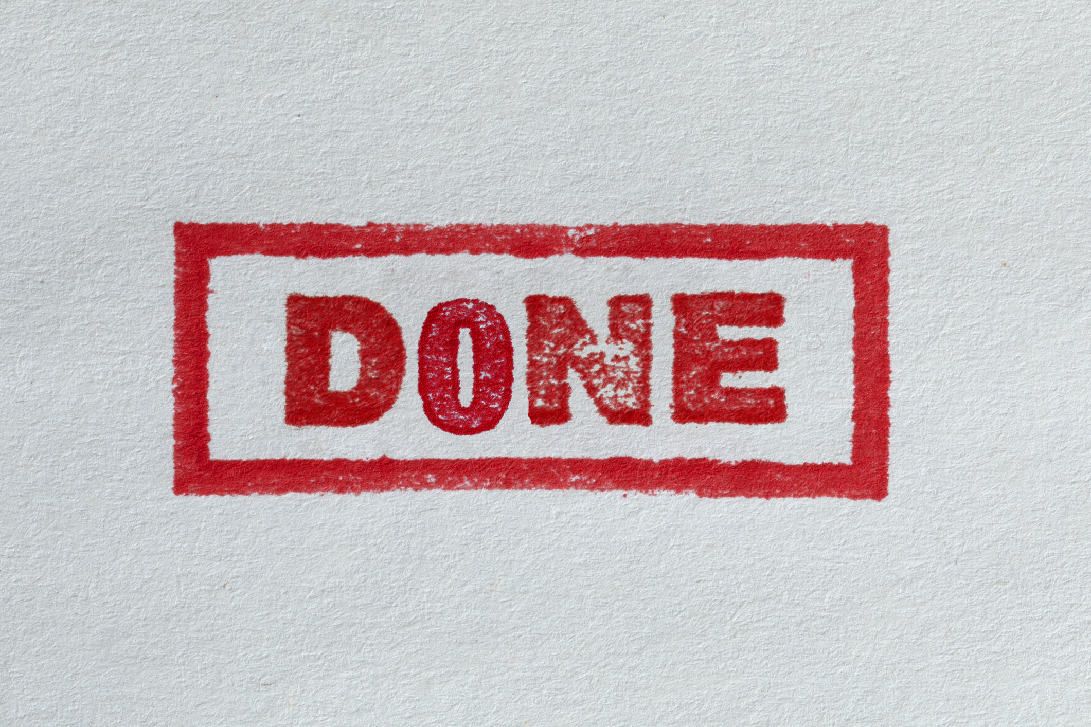 A bold red stamp with the word "done" inside a rectangular frame. 