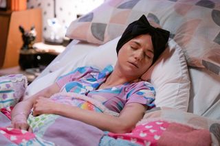 Terminally ill Lola Pearce-Brown asleep in bed in EastEnders. 