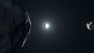 a cube-shaped spacecraft wrapped in foil floats past two irregularly shaped rocks covered in craters