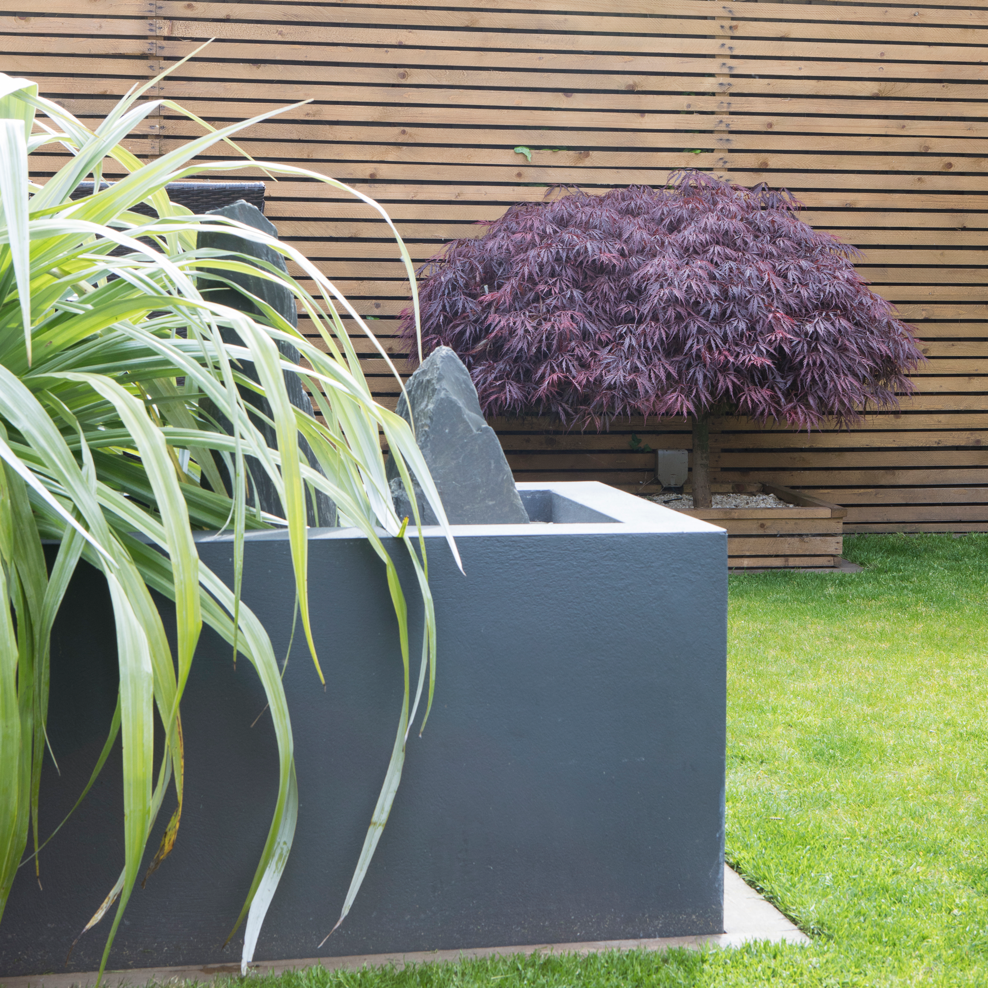 garden with stone and minimalist planting