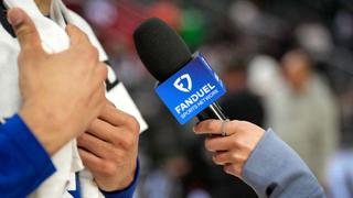 DETROIT, MICHIGAN - FEBRUARY 26: A detailed view of a hand holding a Fanduel Sports Network branded microphone during an interview after the Detroit Pistons defeated the Boston Celtics at Little Caesars Arena on February 26, 2025 in Detroit, Michigan. NOTE TO USER: User expressly acknowledges and agrees that, by downloading and or using this photograph, User is consenting to the terms and conditions of the Getty Images License Agreement. (Photo by Nic Antaya/Getty Images)