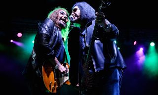 Ace Frehley (left) and Gene Simmons perform onstage