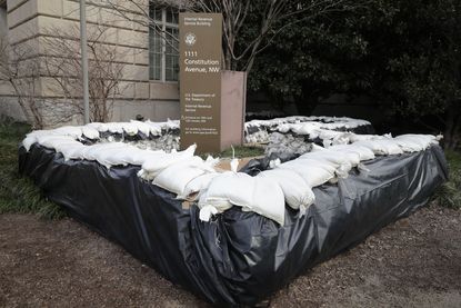 IRS sign surrounded by sandbags