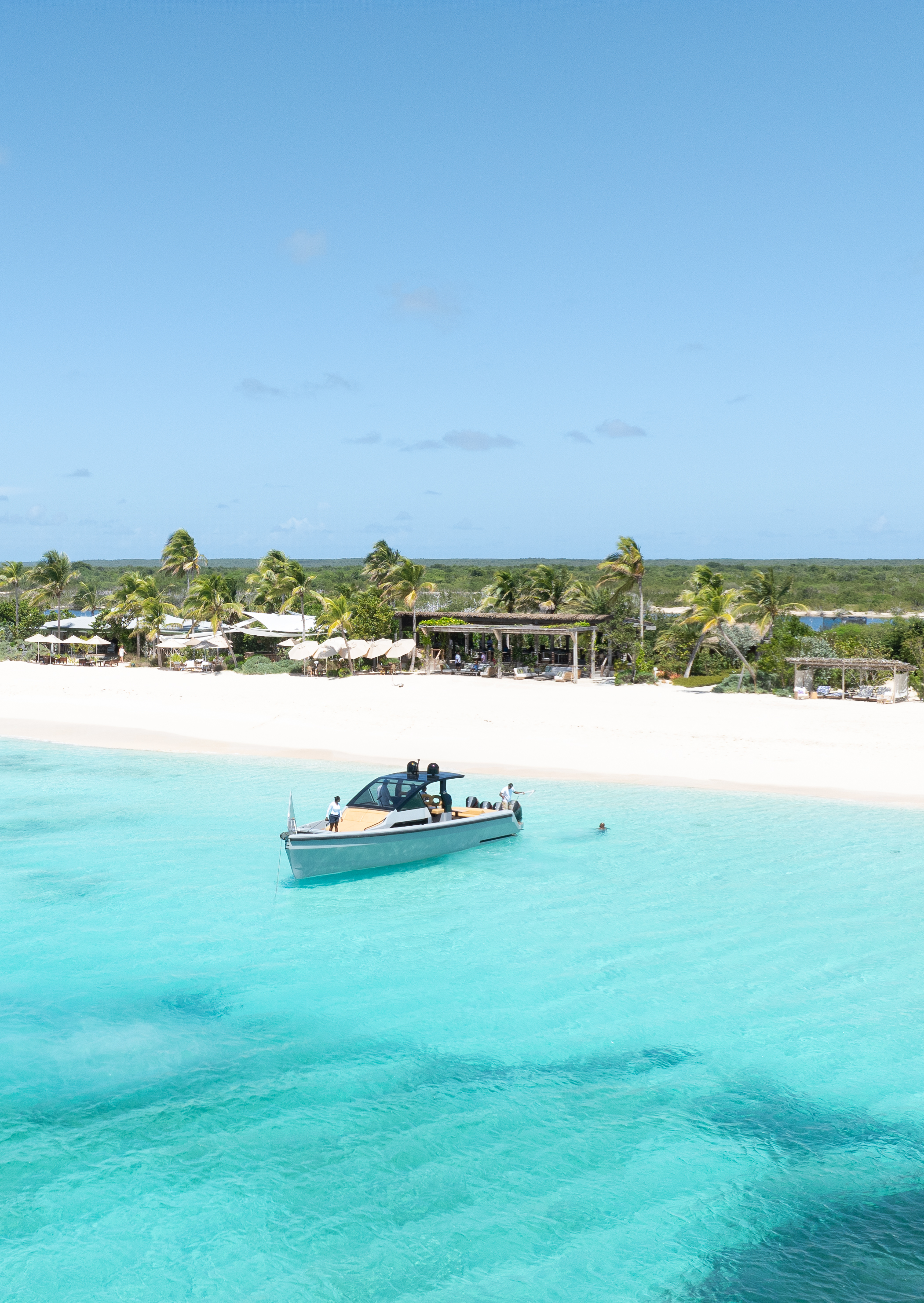 Nobu beach in Barbuda, blue waters and sky, white sand