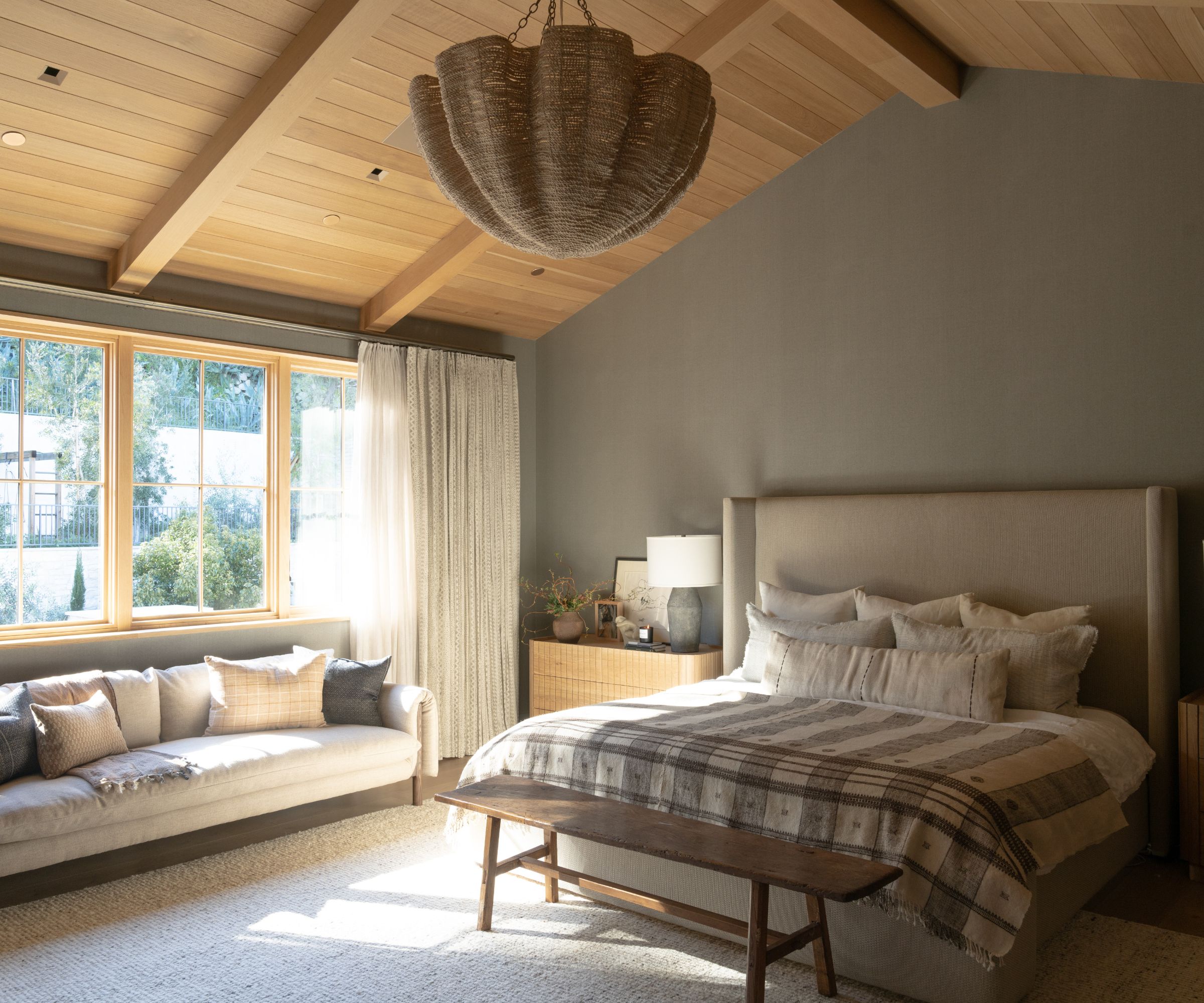 primary bedroom with vaulted ceiling