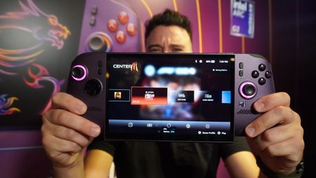 Paul Antill holding the MSI Claw 8 EX AI+ up for the camera at Computex 2026