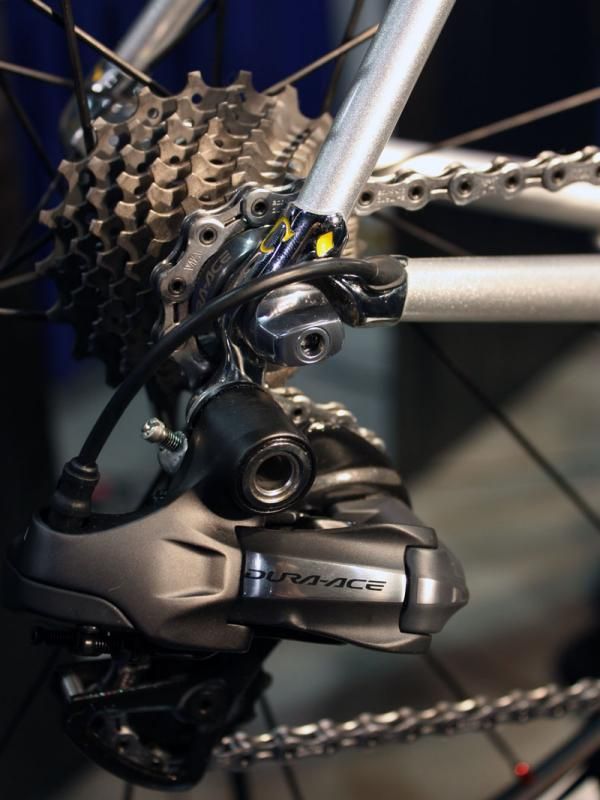 The rear derailleur wire exits just ahead of the chromed dropout.