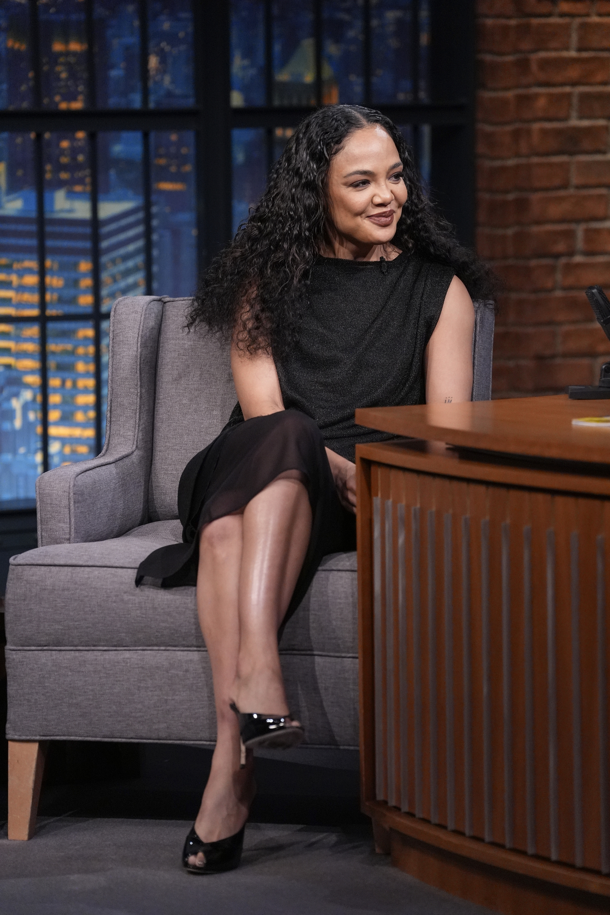 Tessa Thompson wearing peep toe shoes.