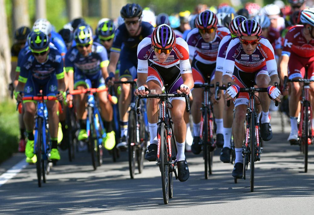 Cyclo-cross star Mathieu van der Poel powers the front of the peloton near the end of stage 1 at the Belgian Tour