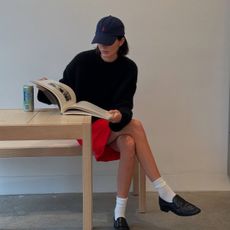 Kendall Jenner wearing a baseball hat