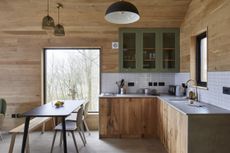 Rustic cabin kitchen designed by The Main Company