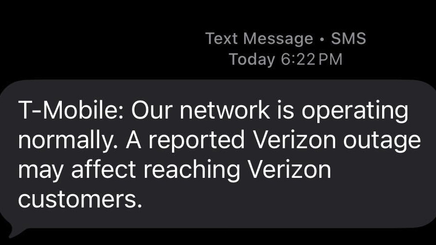 A screenshot of a text message sent to T-Mobile customers about the Verizon outage