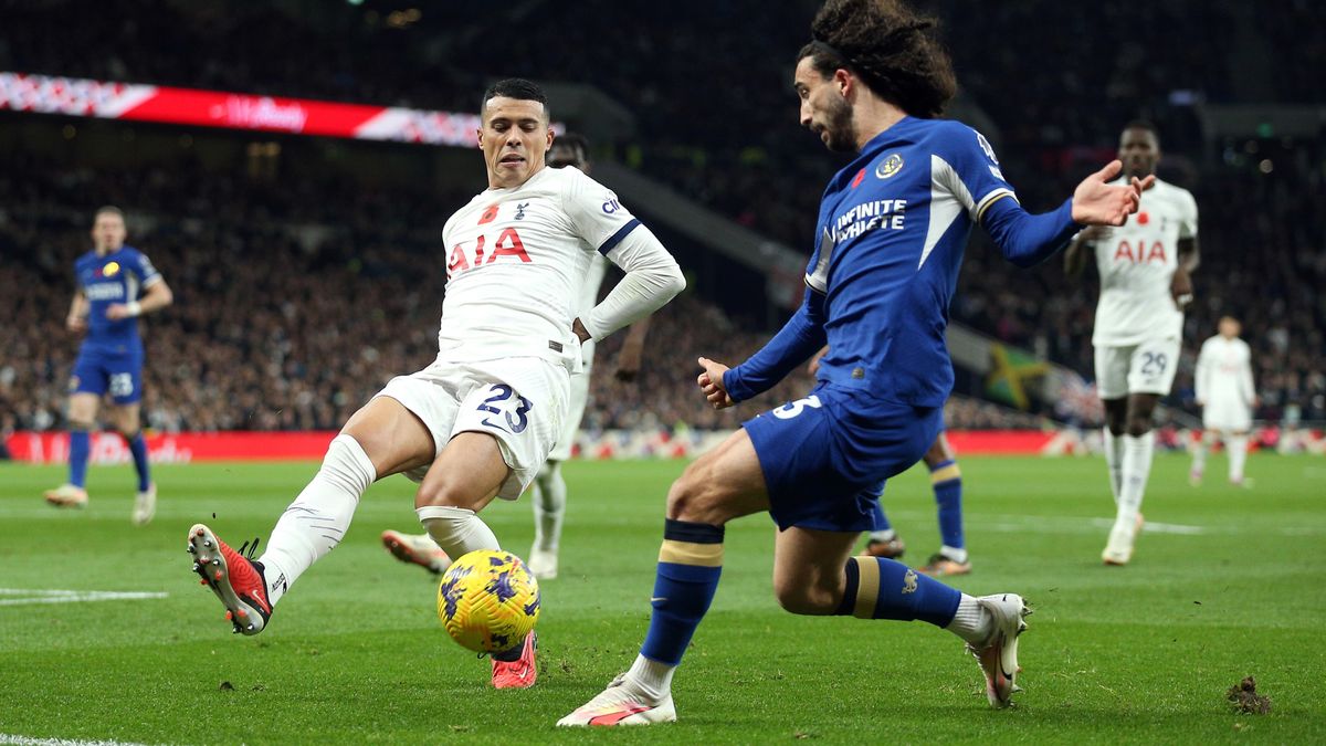 Pedro Porro of Tottenham Hotspur and Marc Cucurella of Chelsea challenge during the Premier League match between Tottenham Hotspur and Chelsea FC