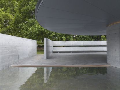 interior of MPavilion 10 by Tadao Ando with pool water