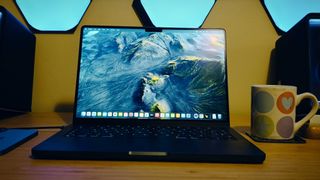 A MacBook Pro 14 (M4, 2024) on a desk