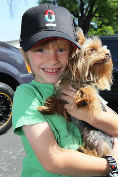 George came out to watch the race festivities with his Yorkie dog Sophie.