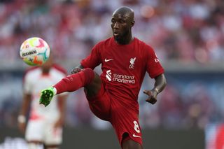 Naby Keita of Liverpool runs with the ball during the pre-season friendly match between RB Leipzig and Liverpool FC at Red Bull Arena on July 21, 2022 in Leipzig, Germany.
