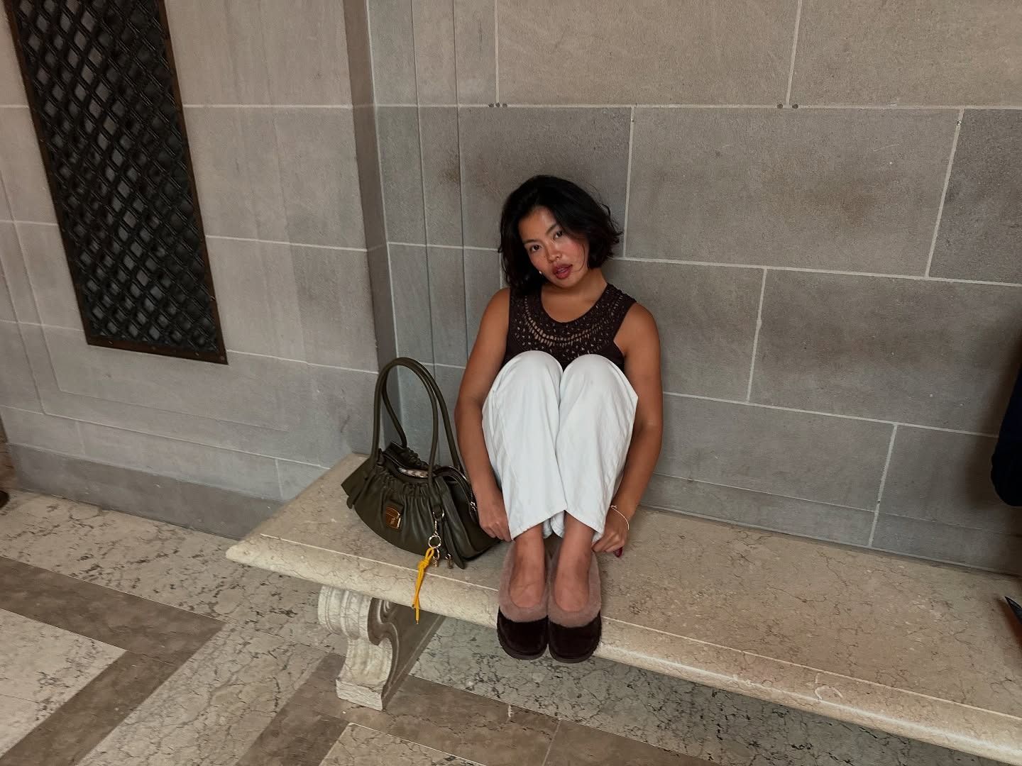 Fashion person Allison Ho wears London winter shoe trends 2025. She wears the UGG Zora ballet flat.