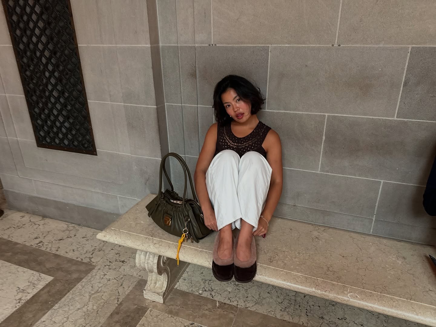 Fashion person Allison Ho wears London winter shoe trends 2025. She wears the UGG Zora ballet flat.