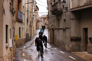 Riders pass through a typical Volta a Catalunya town 