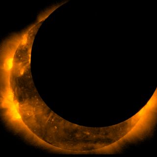 This image taken by the Hinode satellite shows the annular solar eclipse at its maximum on May 20, 2012.