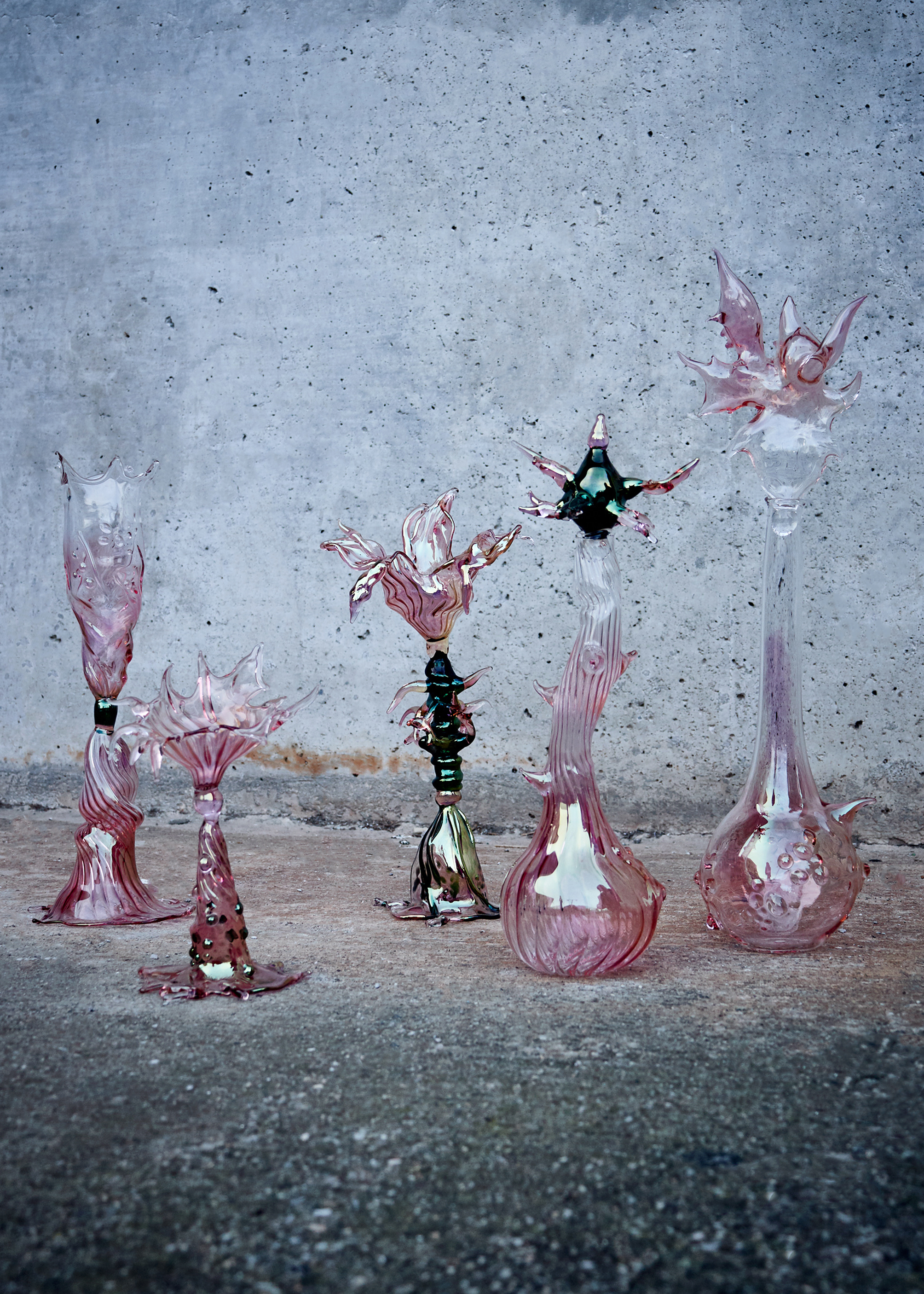 A series of handblown glass sculptures mimic the look of a blooming flower, while way more futuristic.