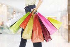 Woman holding shopping bags. 