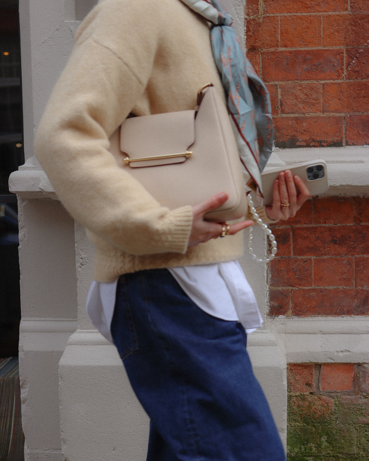 Best Strathberry handbags: @modestmira_ carries the Strathberry East West bag