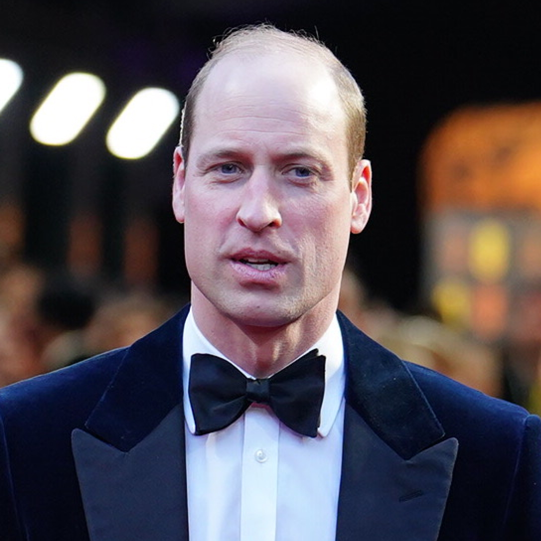 Prince William wears a tuxedo and bow tie on the red carpet
