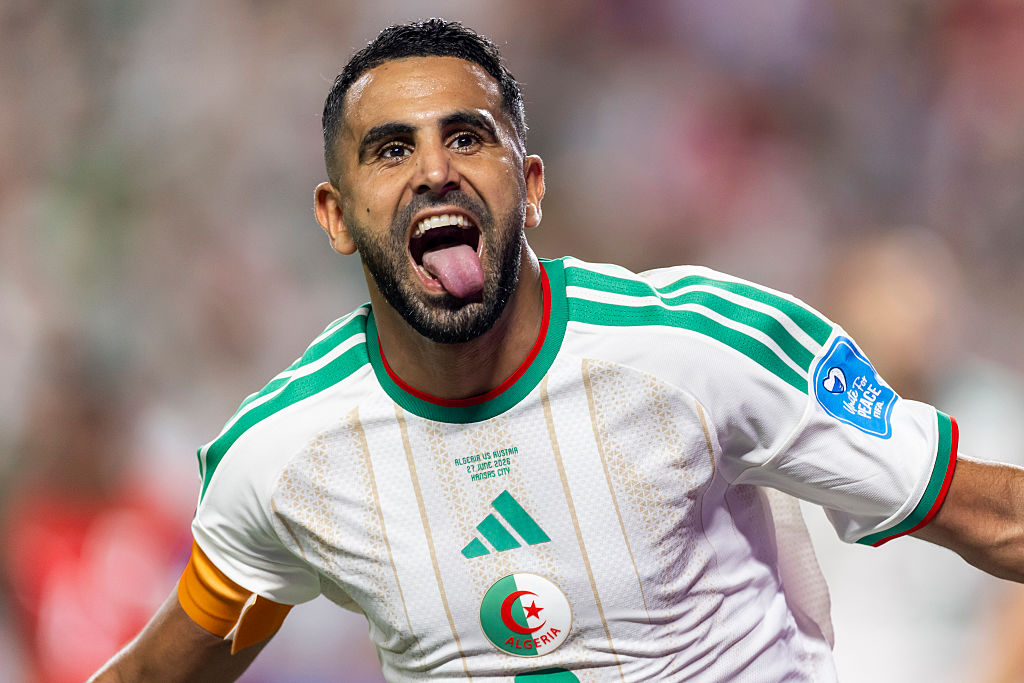 Riyad Mahrez celebrates his goal for Algeria against Austria